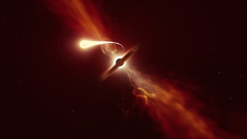 Οι επιστήμονες κατέγραψαν το πιο κοντινό αστέρι στη Γη που καταβροχθίζεται από μια τεράστια μαύρη τρύπα ενώ «φτύνει» τα κομμάτια του! 